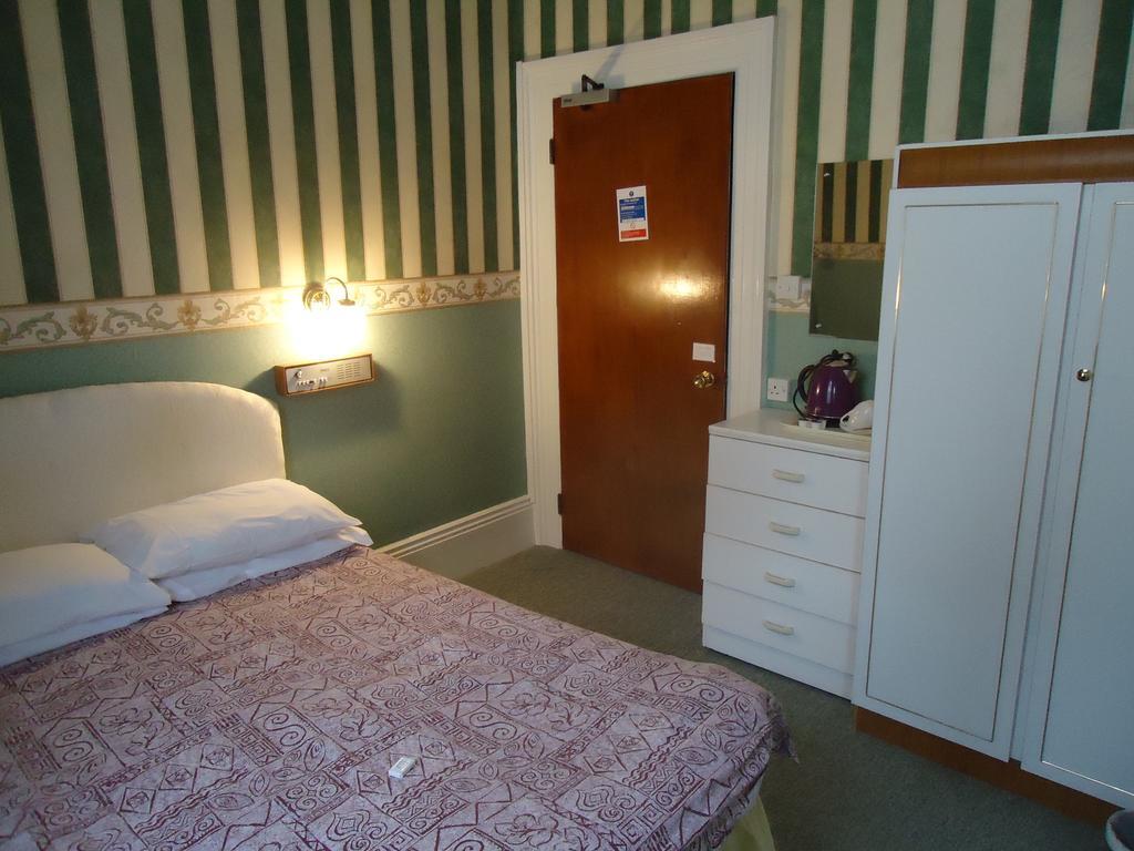 Abbey Court Hotel Torquay Ruang foto