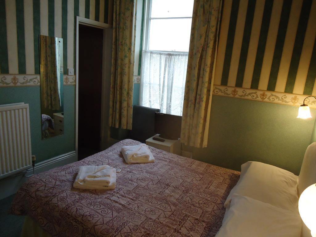 Abbey Court Hotel Torquay Ruang foto