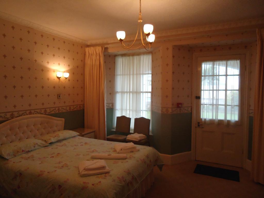 Abbey Court Hotel Torquay Ruang foto