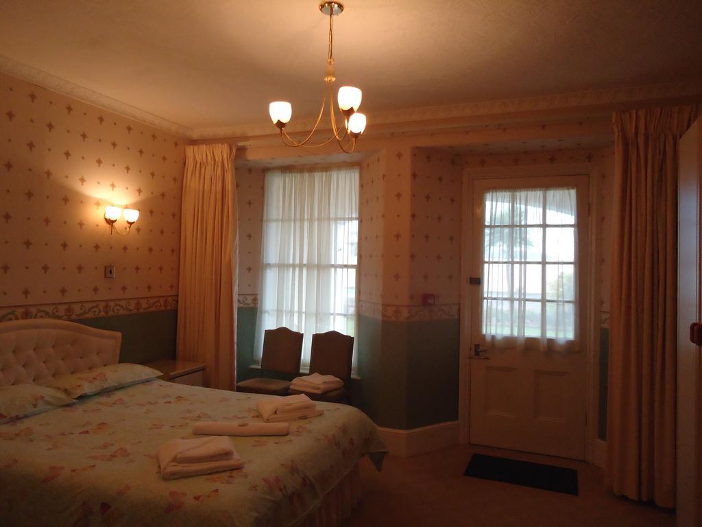 Abbey Court Hotel Torquay Ruang foto